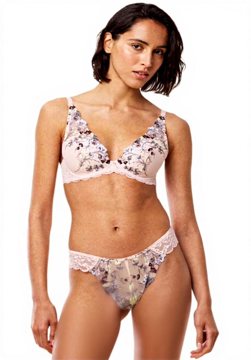 Pavo Monitor Arm installed on a modern office desk